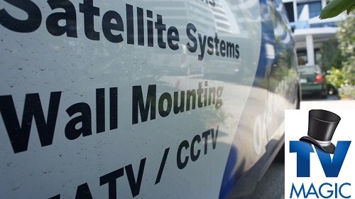 The side of a TV Magic van with services listed