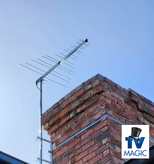 A TV Magic antenna installation on brick.