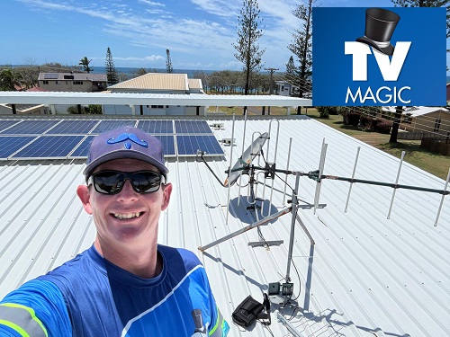 Technician showing off a new antenna installation in South Maclean