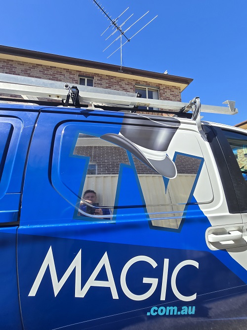 TV Magic van below an antenna installation