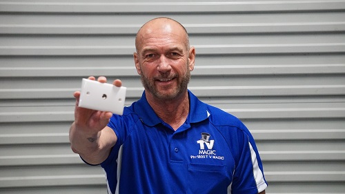 Technician holding up a TV point