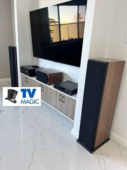 A complete home theatre setup. Logo left centre.