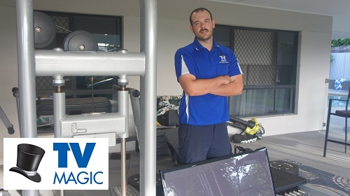 Technician with a TV for outdoor installation