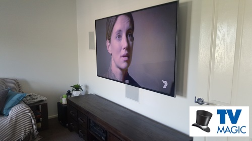 Large screen with TV Magic logo in bottom right corner