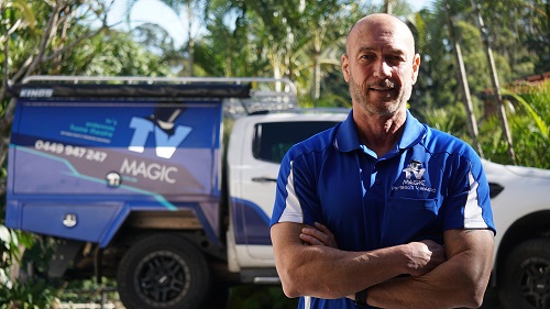 Technician - Darren with his vehicle