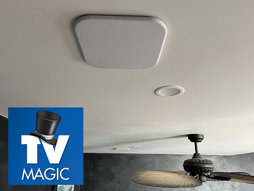 An In-ceiling speaker installation. TV Magic logo in bottom left corner