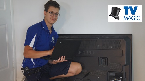 Technician completing a TV Damage Report
