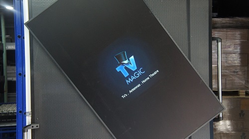 A revolving TV installation with TV Magic logo on screen