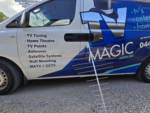 Antenna leaning up against TV Magic van