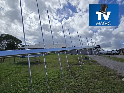 Antenna held out in front of large property