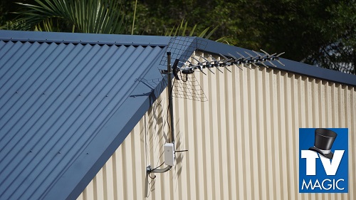 an aerial installation on a tin roof with TV Magic logo in bottom right corner