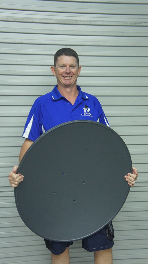 Technician holding a satellite dish.