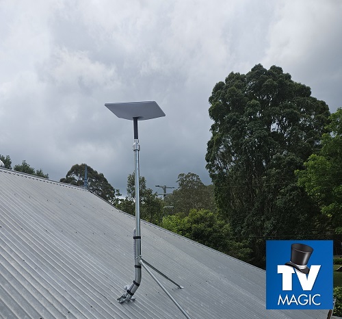 Starlink installation on extended mast. Logo in bottom right corner