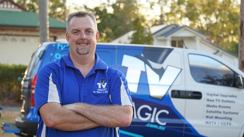 Technician - Anton, in front of his van.