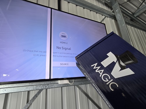 Large TV with obvious damage. TV Magic logo in bottom right corner