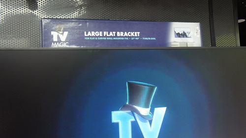 Large screen with TV Magic wall bracket on top