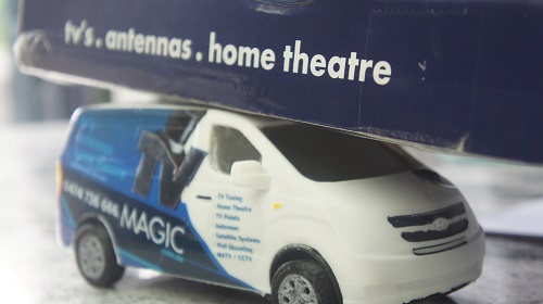 Mini TV Magic van with TV Magic wall bracket on top of it