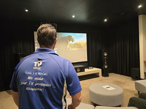 Technician in TV Magic home cinema