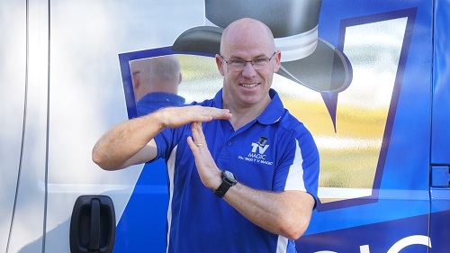 Technician - Carl, making a T for TV Magic with his hands.