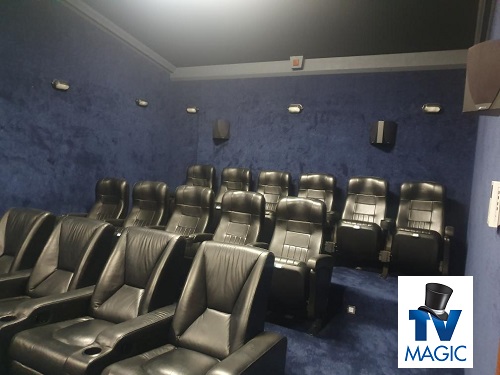 cinema style seating in a large home cinema. TV Magic logo in top right corner