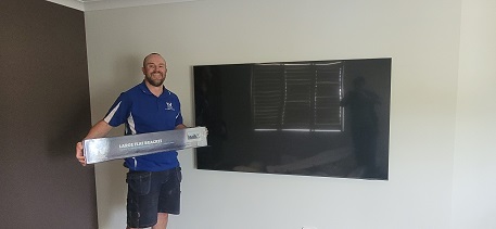 Technician - Vaughan - holding a TV Magic wall bracket