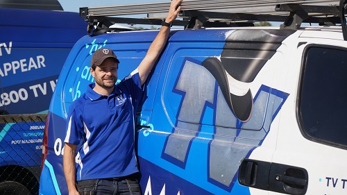 Technician next to his van - Alex