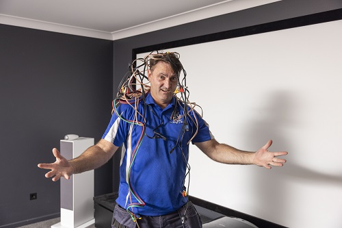 Technician tangled up in cables