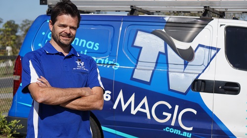 Technician - Alex, next to his van.