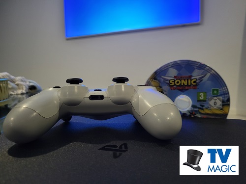 Close up of a gaming controller and game