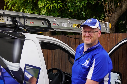Technician - Craig next to his van