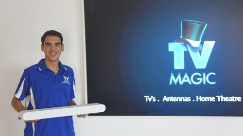Technician holding a soundbar