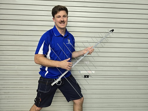Technician holding an aerial