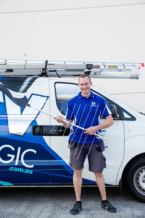 Technician - Paul, holding an antenna