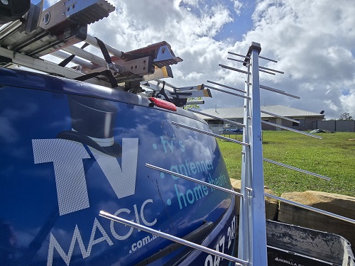 Antenna behind TV Magic  van