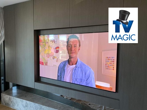 close up of an in-wall TV installation, with TV Magic logo in top right corner