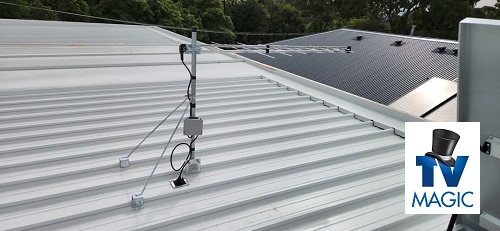 a tidy new Aerial Installation on a tin roof, with TV Magic logo in bottom right corner