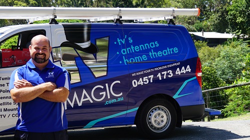 Technician - Jake, next to his van.