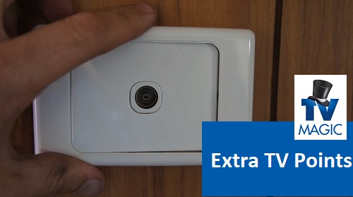 close up of a technician holding a TV point. Caption "Extra TV Points" and TV Magic logo in bottom right corner