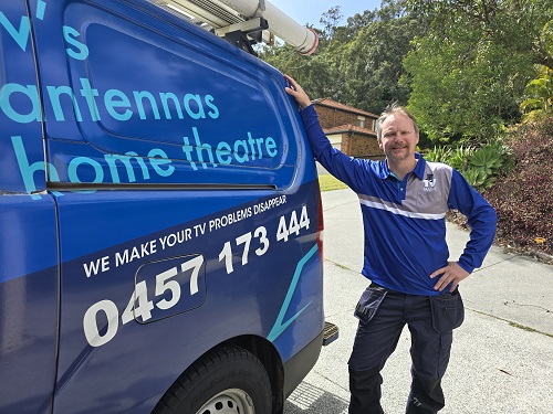 Technician - Jason, next to his van.