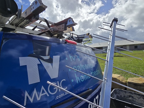 TV Magic van with antenna held up to it