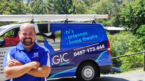 Technician - Jake, next to his van.