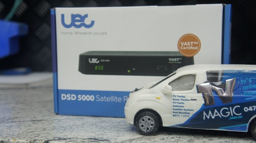 Vast box with mini TV Magic van in front of it