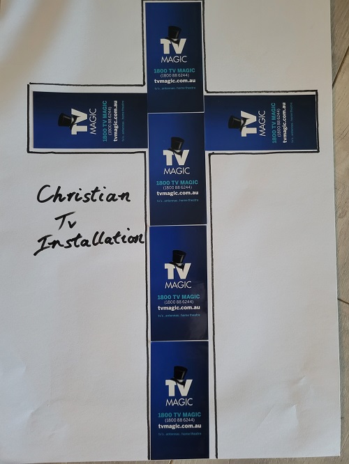 Cross made from TV Magic stickers. Caption "Christian TV Installation"
