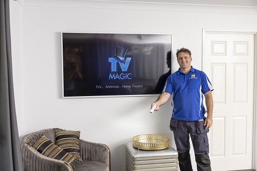 Technician with a Samsung Frame freshly installed