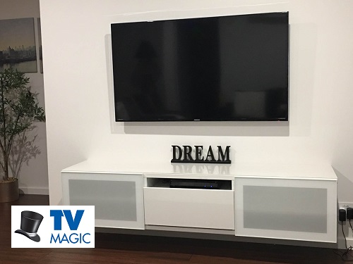 TV Installation by TV Magic - Logo in bottom left corner