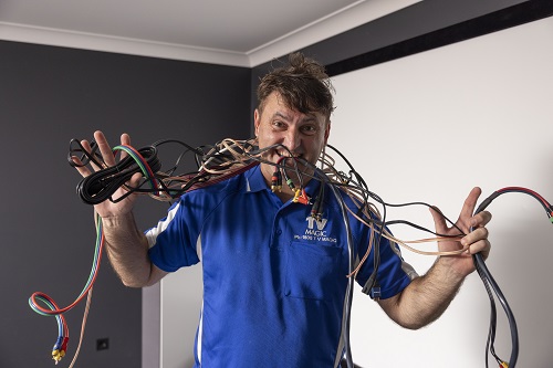 Technician tangled in cables