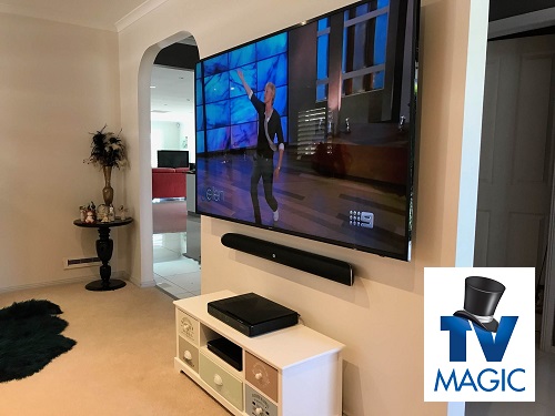 A TV and soundbar system by TV Magic.