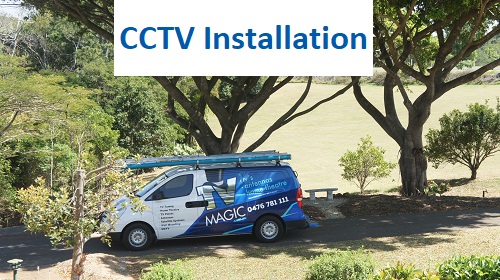 a van under trees with caption "CCTV installation" at top of picture