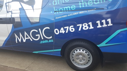 Side of TV Magic van