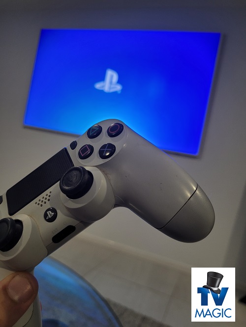 Wall mounted TV with gaming remote